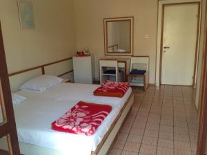 Postel nebo postele na pokoji v ubytování Villa Michel