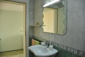 Ванная комната в Bache Apartments