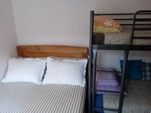 Postel nebo postele na pokoji v ubytování Apartman" Afrodita"