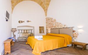 Posteľ alebo postele v izbe v ubytovaní Il Cortile dei Nonni
