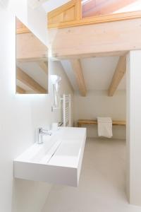 A bathroom at La Giostra Home Apartments