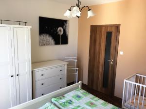 Postel nebo postele na pokoji v ubytování Apartmány Vojta