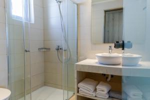 Ein Badezimmer in der Unterkunft Rodos Star Hotel