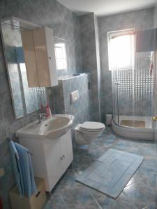 Koupelna v ubytování Apartments Diana + 45 fotografií