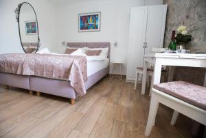 Postel nebo postele na pokoji v ubytování Guest House Paradise