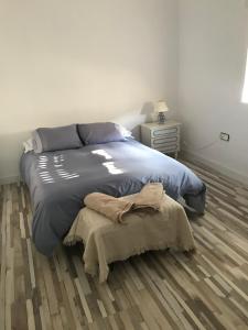 Postel nebo postele na pokoji v ubytování Villa pilonga