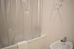 Koupelna v ubytování Glamdream Apartment + 22 fotografií