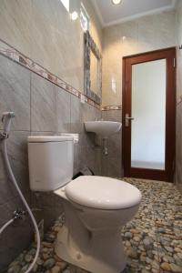 Koupelna v ubytování Jempiring Homestay