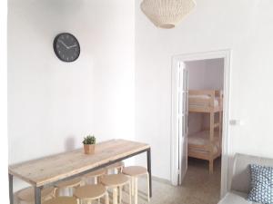 Łóżko lub łóżka w pokoju w obiekcie CH Apartments