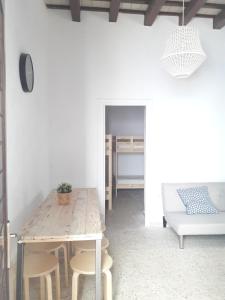 Łóżko lub łóżka w pokoju w obiekcie CH Apartments