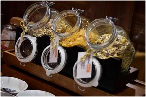 a group of dishes in glass domes on a table at Motel Plus Berlin in Berlin
