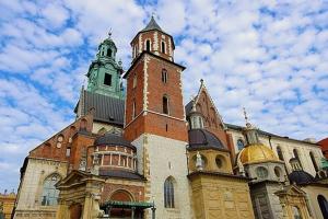 a large building with a tower on top of it at Pokoje Gościnne Centrum in Krakow
