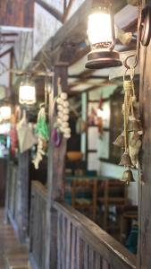 a close up of a room with lights on the wall at The Monastery Guest House in Ivanovo