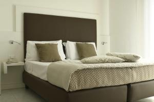 Katil atau katil-katil dalam bilik di Hotel El Salvador Frontemare Piscina Riscaldata
