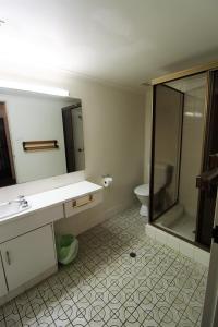 A bathroom at Macquarie Towers 17 1 Waugh Street