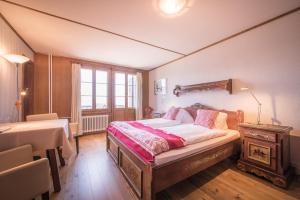 Letto o letti in una camera di Hotel Fassbind Beausite