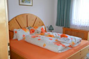 Łóżko lub łóżka w pokoju w obiekcie Ferienwohnung Annemarie
