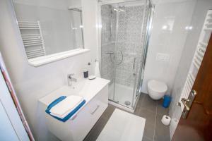 Een badkamer bij Pineta House Vidos