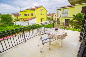 Een balkon of terras bij Pineta House Vidos