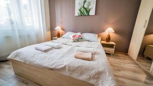 Posteľ alebo postele v izbe v ubytovaní Ana tour
