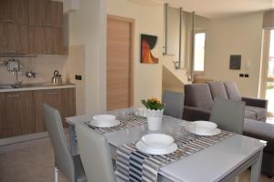 Posezení v ubytování Residence La Perla
