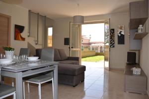 Posezení v ubytování Residence La Perla