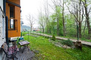 Vonkajšia záhrada v ubytovaní Apartamenty Sun & Snow Poronin