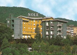 a building with the word solo on top of it at Hotel Sole in Chianciano Terme