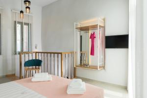 Postel nebo postele na pokoji v ubytování The48suites