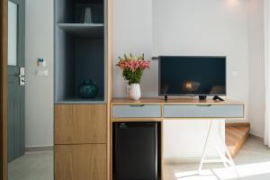TV a/nebo společenská místnost v ubytování The48suites