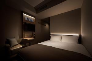 Postel nebo postele na pokoji v ubytování Nest Hotel Tokyo Hanzomon