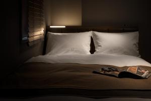 Postel nebo postele na pokoji v ubytování Nest Hotel Tokyo Hanzomon