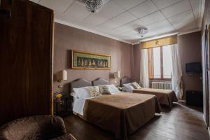 TV a/nebo společenská místnost v ubytování Hotel Residenza In Farnese