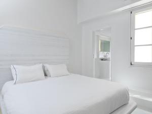 Postel nebo postele na pokoji v ubytování Villa Kampani Sea View Villa Mykonos Town