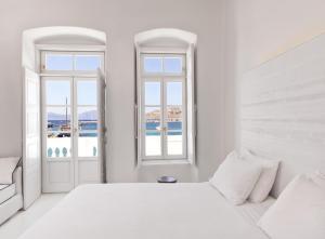 Postel nebo postele na pokoji v ubytování Villa Kampani Sea View Villa Mykonos Town