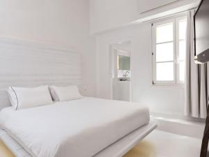 Postel nebo postele na pokoji v ubytování Villa Kampani Sea View Villa Mykonos Town