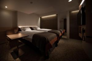 Postel nebo postele na pokoji v ubytování Nest Hotel Tokyo Hanzomon