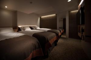 Postel nebo postele na pokoji v ubytování Nest Hotel Tokyo Hanzomon + 28 fotografií
