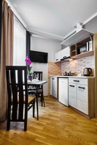 Kuchyň nebo kuchyňský kout v ubytování ANTARES Apart hotel
