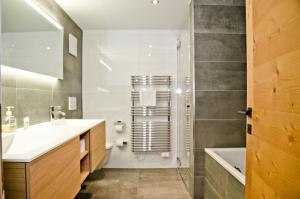 Koupelna v ubytování Apartment Fortuna 5.5 - GriwaRent AG