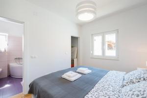 Posteľ alebo postele v izbe v ubytovaní Villa Donato with Jacuzzi