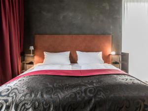 Postel nebo postele na pokoji v ubytování monte mare SAUNA-SPA-SPORTS-HOTEL
