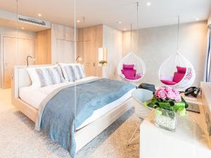 Postel nebo postele na pokoji v ubytování monte mare SAUNA-SPA-SPORTS-HOTEL