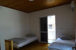 Postel nebo postele na pokoji v ubytování Buff Hostel Tirana