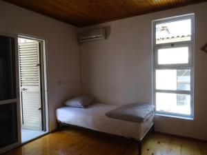 Postel nebo postele na pokoji v ubytování Buff Hostel Tirana