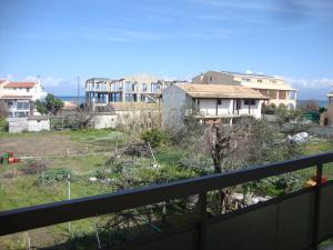 a view from the balcony of a house at Alex Apartments in Roda