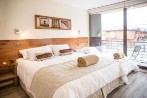 Postel nebo postele na pokoji v ubytování Maki Hotel