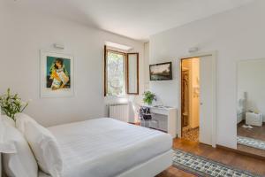 Posteľ alebo postele v izbe v ubytovaní Villa I Barronci Resort & Spa