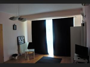 TV a/nebo společenská místnost v ubytování Casa Rendez Vous
