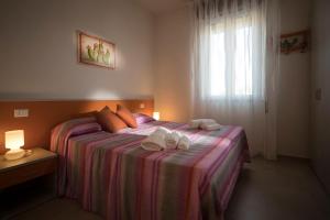Postel nebo postele na pokoji v ubytování B&B Z'Angelina